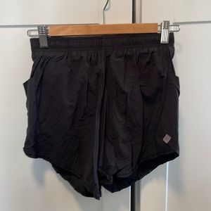 Oiselle Long Flyout Shorts Black size 4